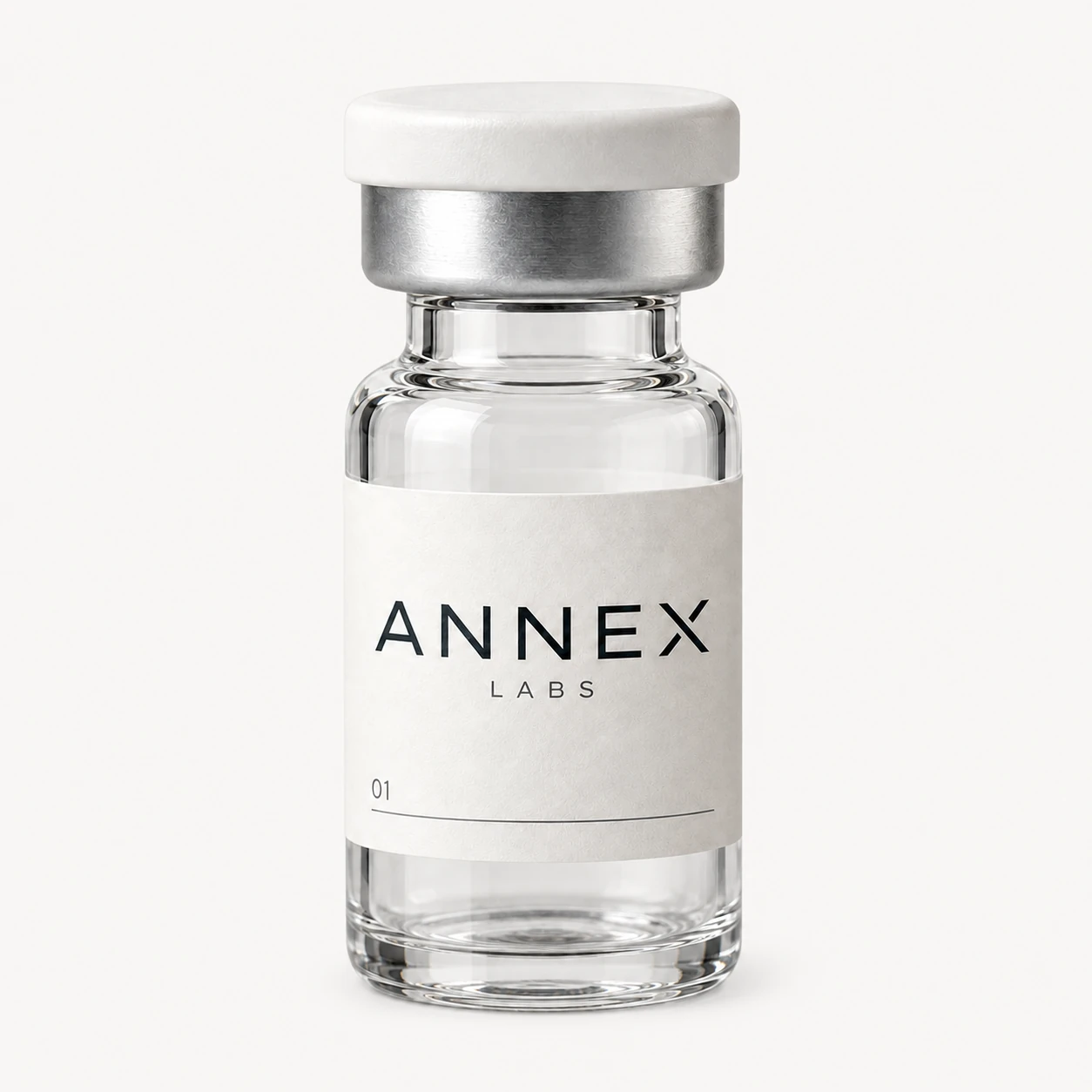 Annex Labs glass vial with a warm-white label and silver cap